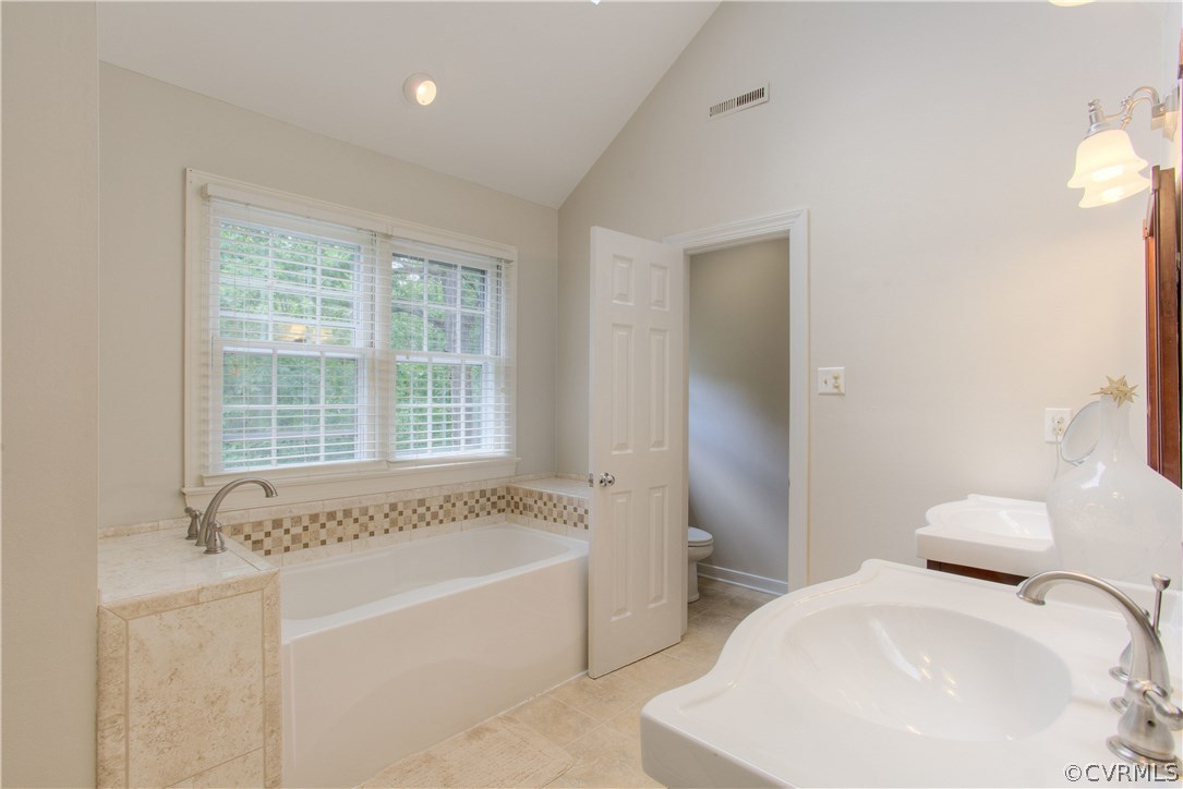 13641 Glendower Road Midlothian, VA 23113 - Photo 25 of 38 a spacious bathroom with sink and bathtub