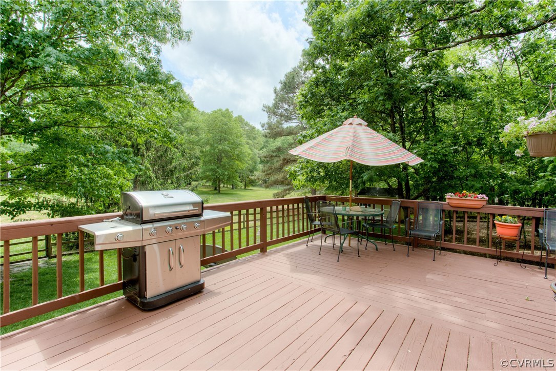 13641 Glendower Road Midlothian, VA 23113 - Photo 33 of 38 a view of a chair and tables on the deck