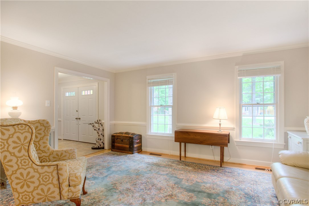 13641 Glendower Road Midlothian, VA 23113 - Photo 7 of 38 a living room with furniture a dining table and a window