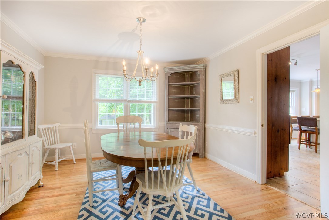 13641 Glendower Road Midlothian, VA 23113 - Photo 8 of 38 a view of a dining room with furniture window and outside view