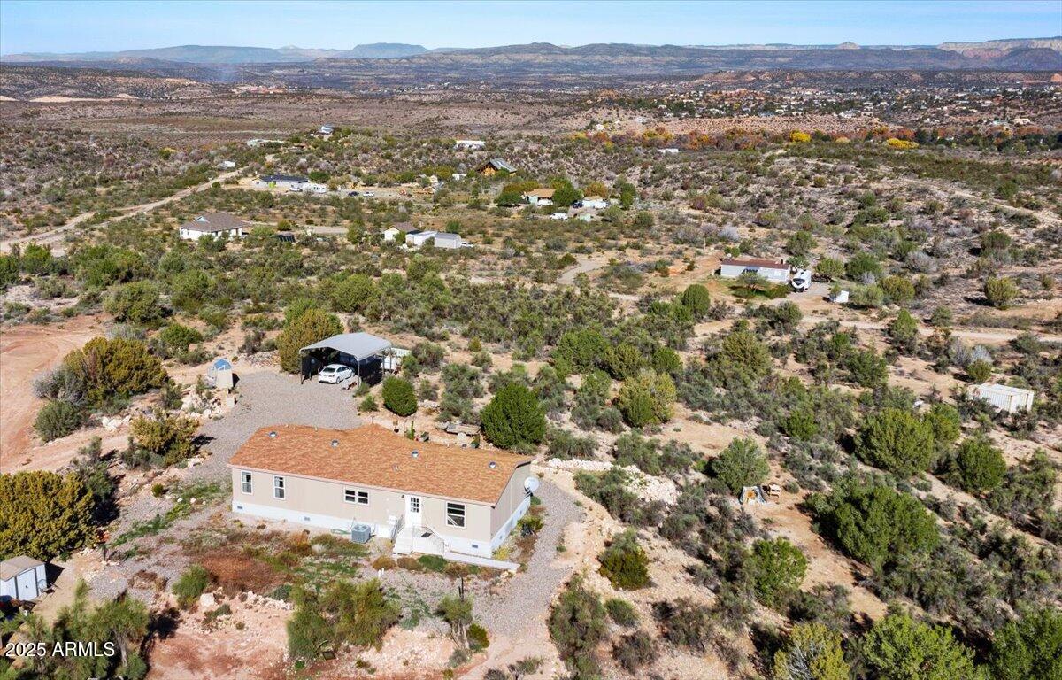 3145 Fort Verde Trail Rimrock, AZ 86335 - Photo 2 of 12 an aerial view of residential houses with outdoor space