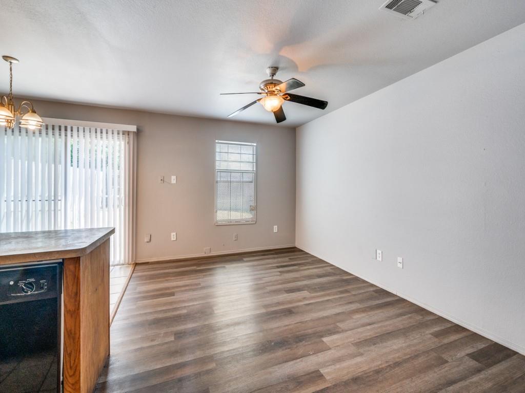 2325 Donalee Street, Unit 2325 Fort Worth, TX 76105 - Photo 2 of 13 wooden floor in an empty room with a window