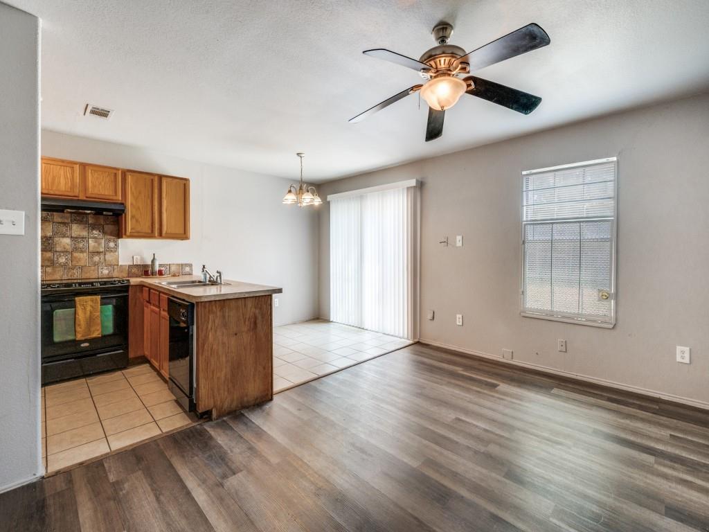 2325 Donalee Street, Unit 2325 Fort Worth, TX 76105 - Photo 3 of 13 a view of kitchen with granite countertop cabinets and window