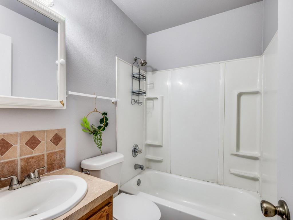 2325 Donalee Street, Unit 2325 Fort Worth, TX 76105 - Photo 6 of 13 a bathroom with a sink toilet and shower
