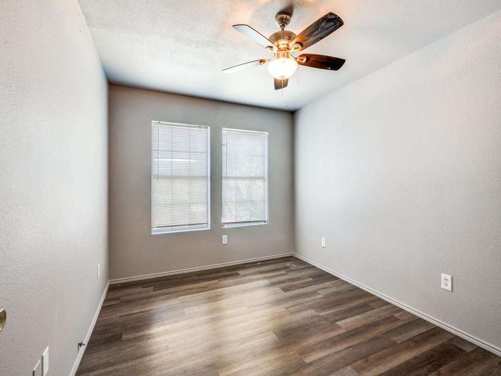 2325 Donalee Street, Unit 2325 Fort Worth, TX 76105 - Photo 7 of 13 an empty room with wooden floor and windows