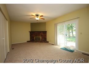 1907 Branch Road Champaign, IL 61821 - Photo 11 of 20 a view of empty room with a fireplace