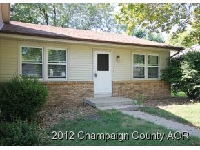 1907 Branch Road Champaign, IL 61821 - Photo 13 of 20 a view of a house with a yard