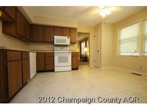 1907 Branch Road Champaign, IL 61821 - Photo 15 of 20 a view of a kitchen with a sink dishwasher and a refrigerator