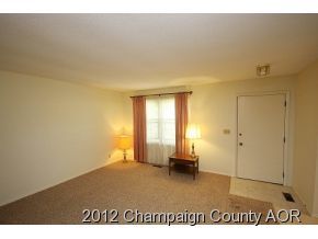 1907 Branch Road Champaign, IL 61821 - Photo 17 of 20 a view of a livingroom with furniture and a window