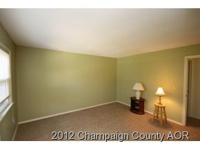 1907 Branch Road Champaign, IL 61821 - Photo 6 of 20 a view of empty room with a window
