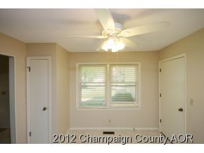 1907 Branch Road Champaign, IL 61821 - Photo 9 of 20 a view of an empty room with a window