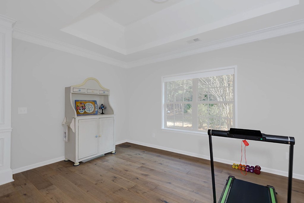 6712 Bridge Way Columbus, GA 31904 - Photo 19 of 36 a view of workspace with furniture window and wooden floor