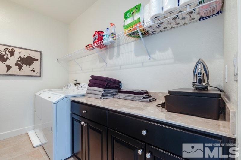 10602 Washington Reno, NV 89521 - Photo 14 of 25 a kitchen with a sink a stove and cabinets