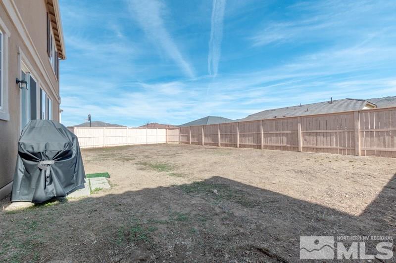 10602 Washington Reno, NV 89521 - Photo 23 of 25 a view of a backyard of the house