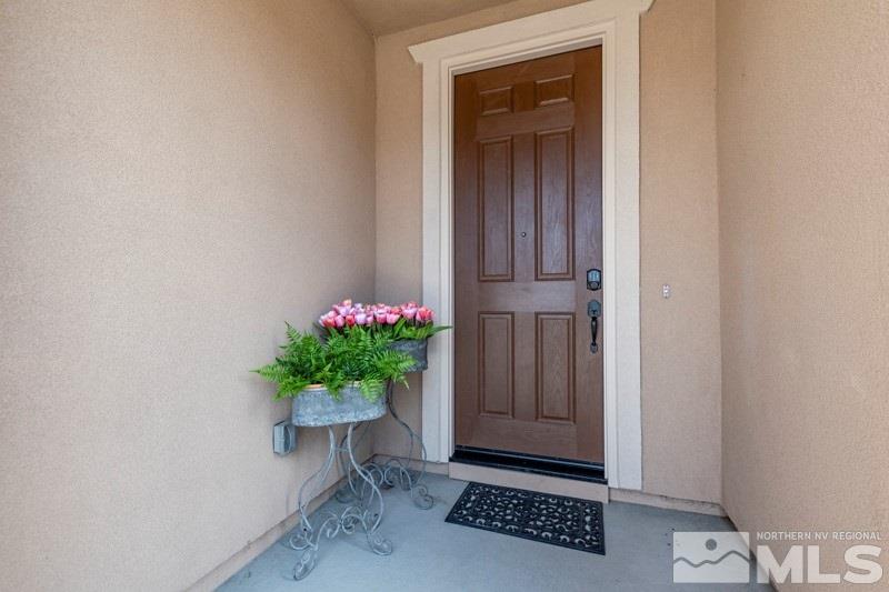 10602 Washington Reno, NV 89521 - Photo 3 of 25 a view of entryway with a potted plant