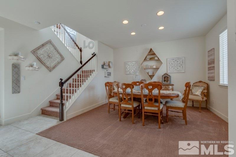 10602 Washington Reno, NV 89521 - Photo 7 of 25 a view of a dining room and hall with furniture