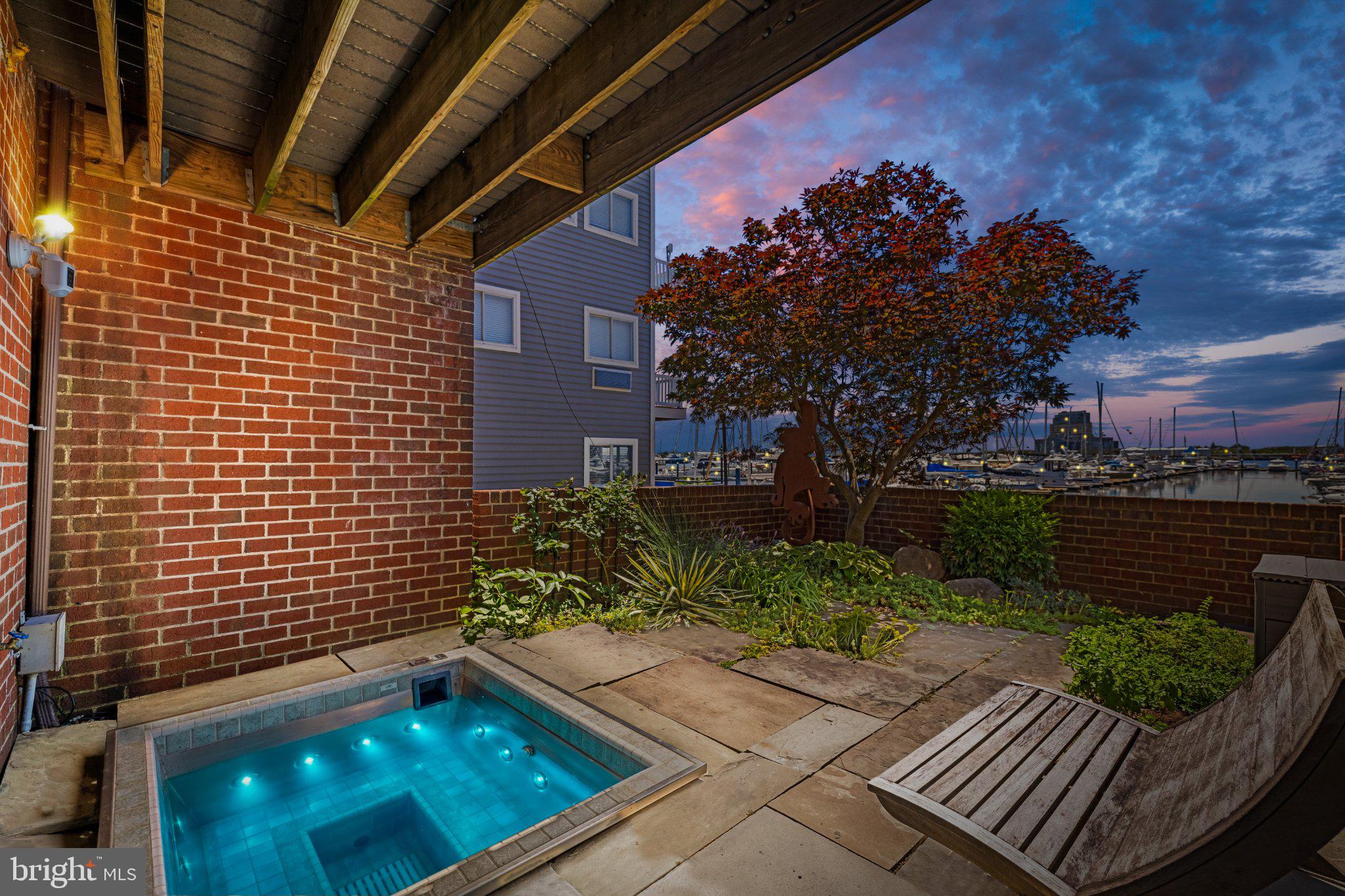 2439 Boston Street Baltimore, MD 21224 - Photo 2 of 78 Tranquil waterfront retreat at dusk.