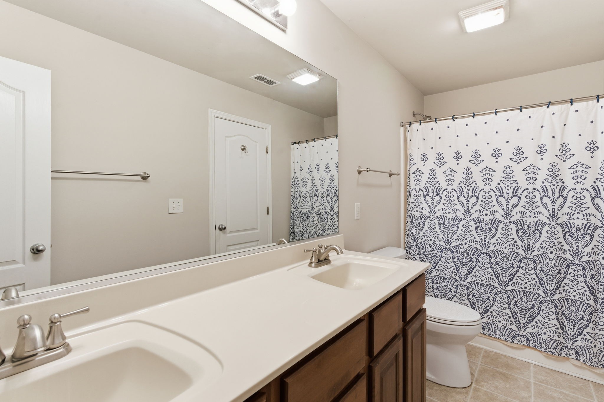 2036 Sparrow Street Spring Hill, TN 37174 - Photo 12 of 25 a bathroom with a sink toilet and shower
