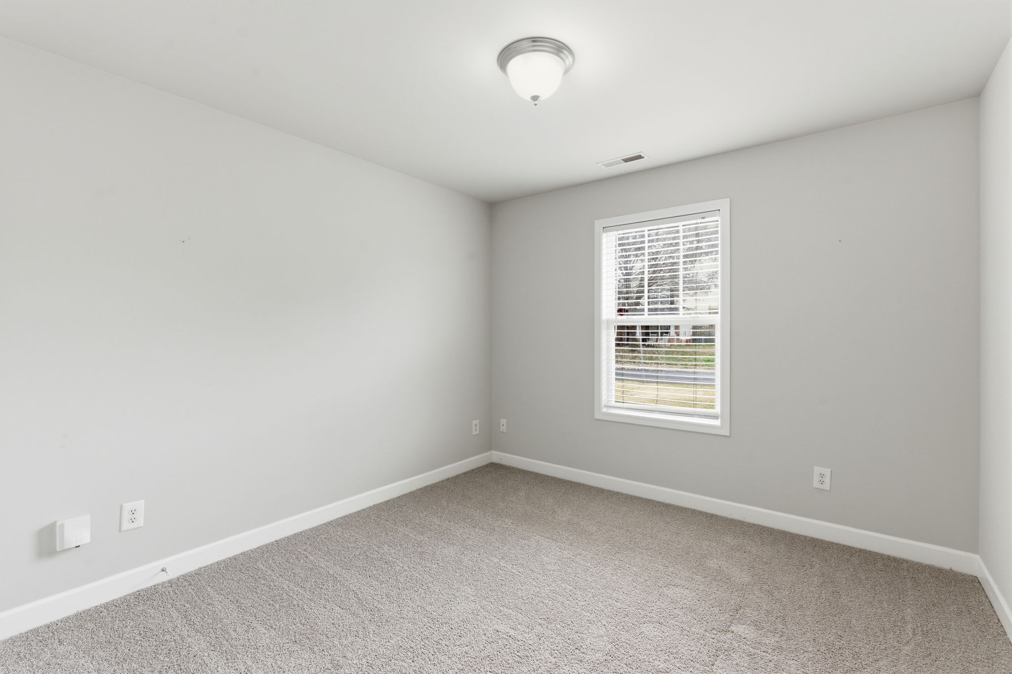 2036 Sparrow Street Spring Hill, TN 37174 - Photo 15 of 25 an empty room with a window