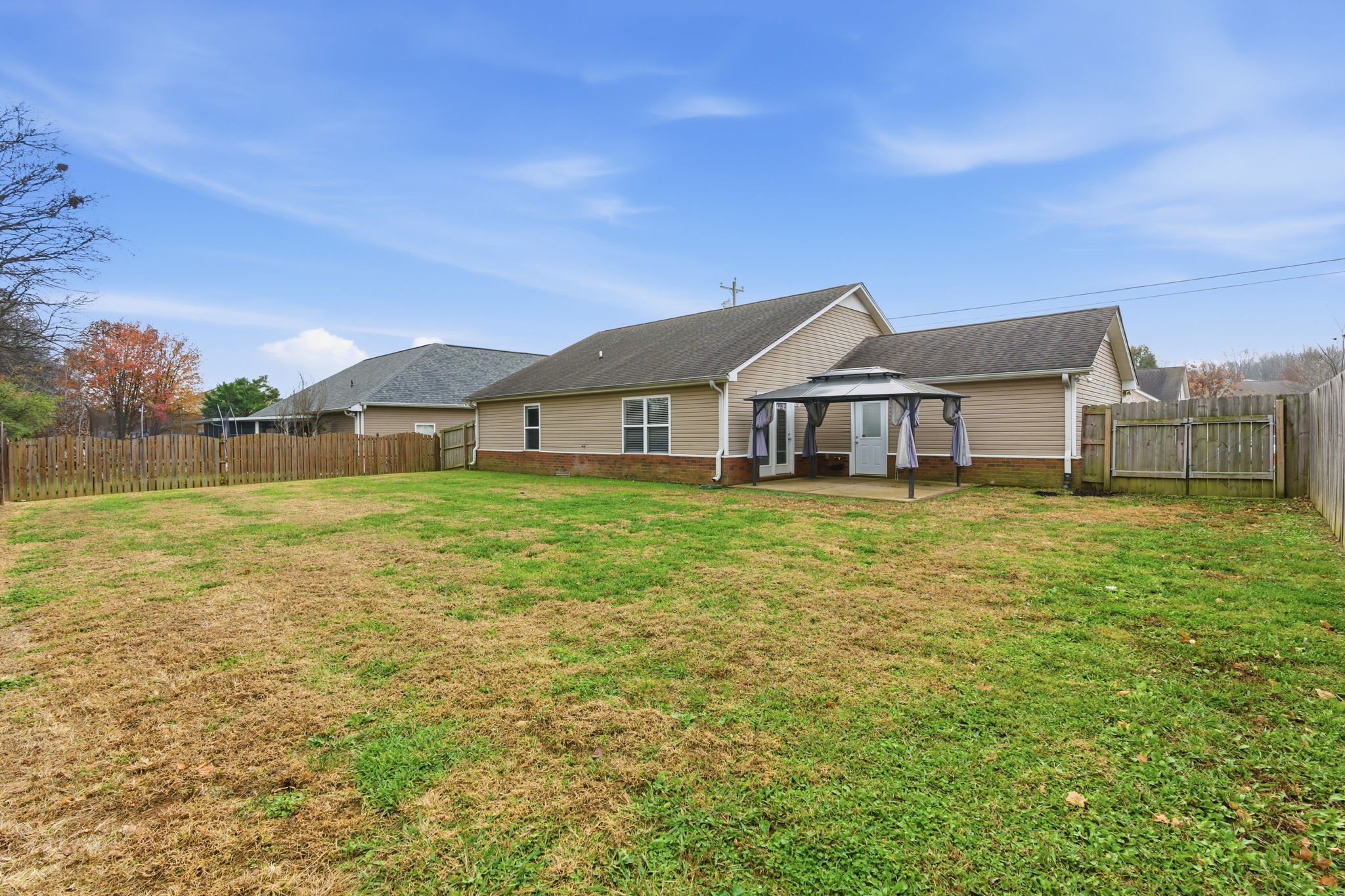 2036 Sparrow Street Spring Hill, TN 37174 - Photo 18 of 25 a front view of a house with a garden