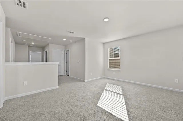 a bathroom with a shower and a sink