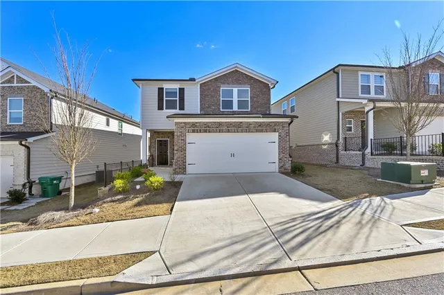 front view of a house with a yard