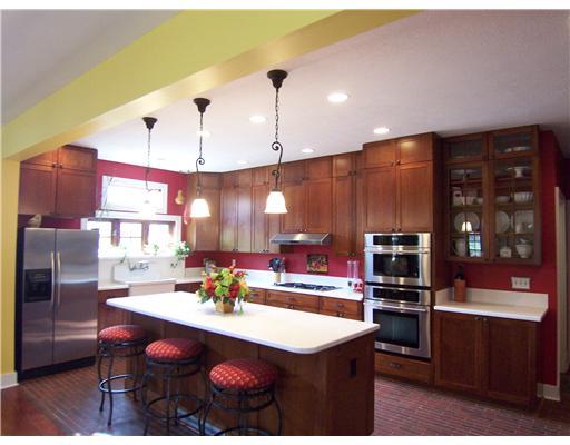 296 McCombs Road Venetia, PA 15367 - Photo 3 of 18 Kitchen. The spacious kitchen features stainless appliances, Cherry cabinets to the ceiling. The large island is a perfet work space or gathering space for the family meals.