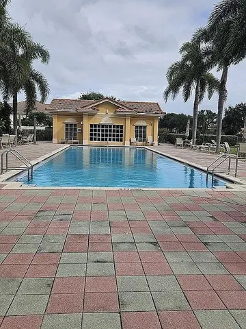 a view of a chair and table on the terrace