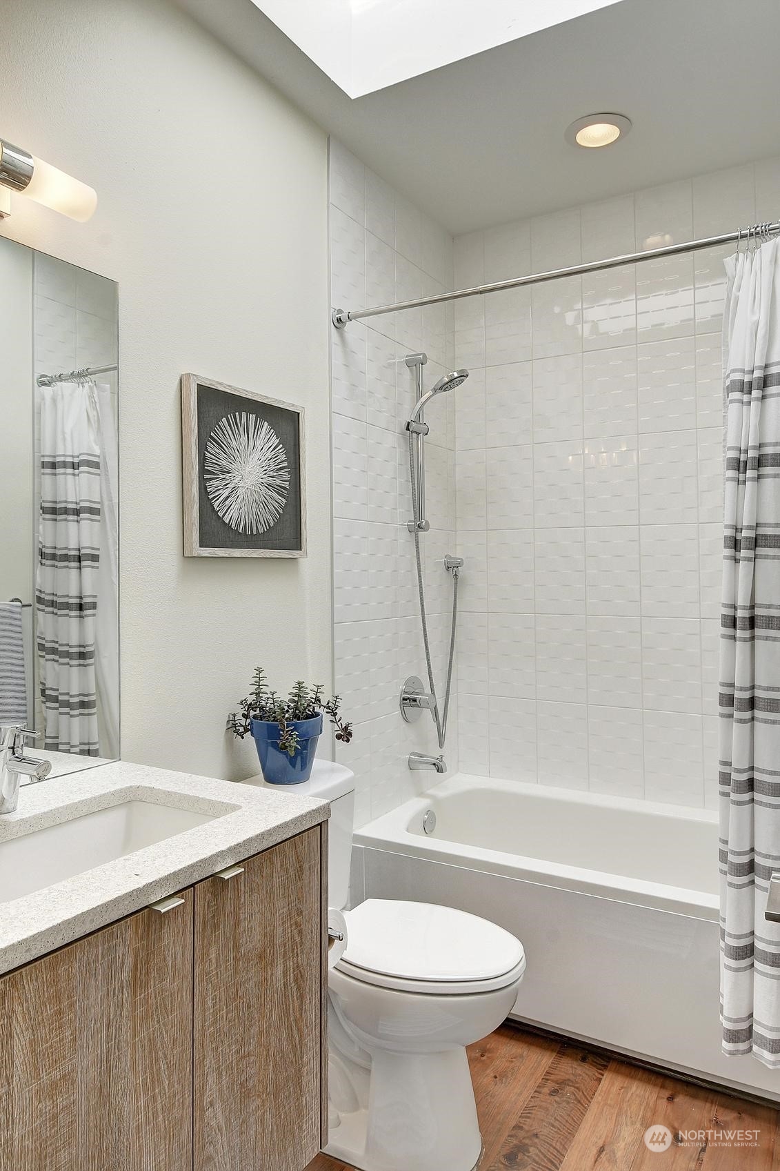 4412 Renton Avenue South Seattle, WA 98108 - Photo 18 of 23 a bathroom with a sink a toilet and a bathtub