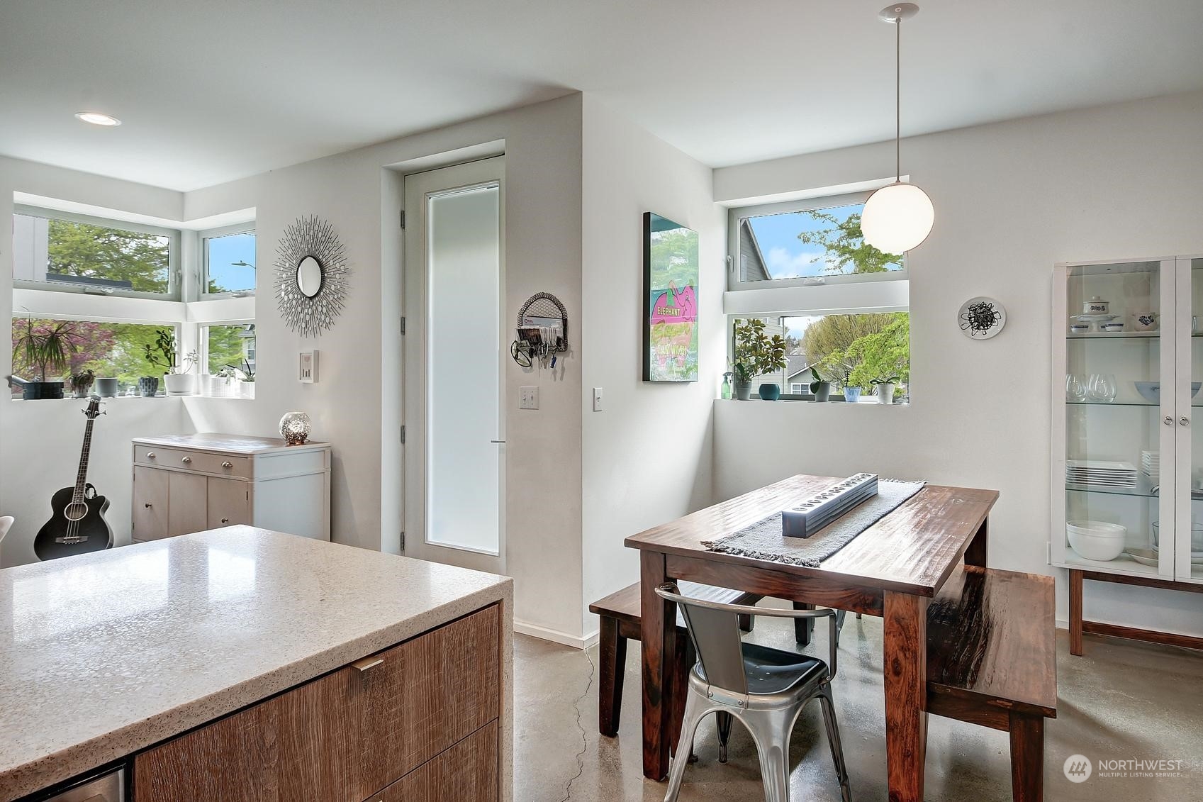 4412 Renton Avenue South Seattle, WA 98108 - Photo 5 of 23 a view of a dining room with furniture and a chandelier