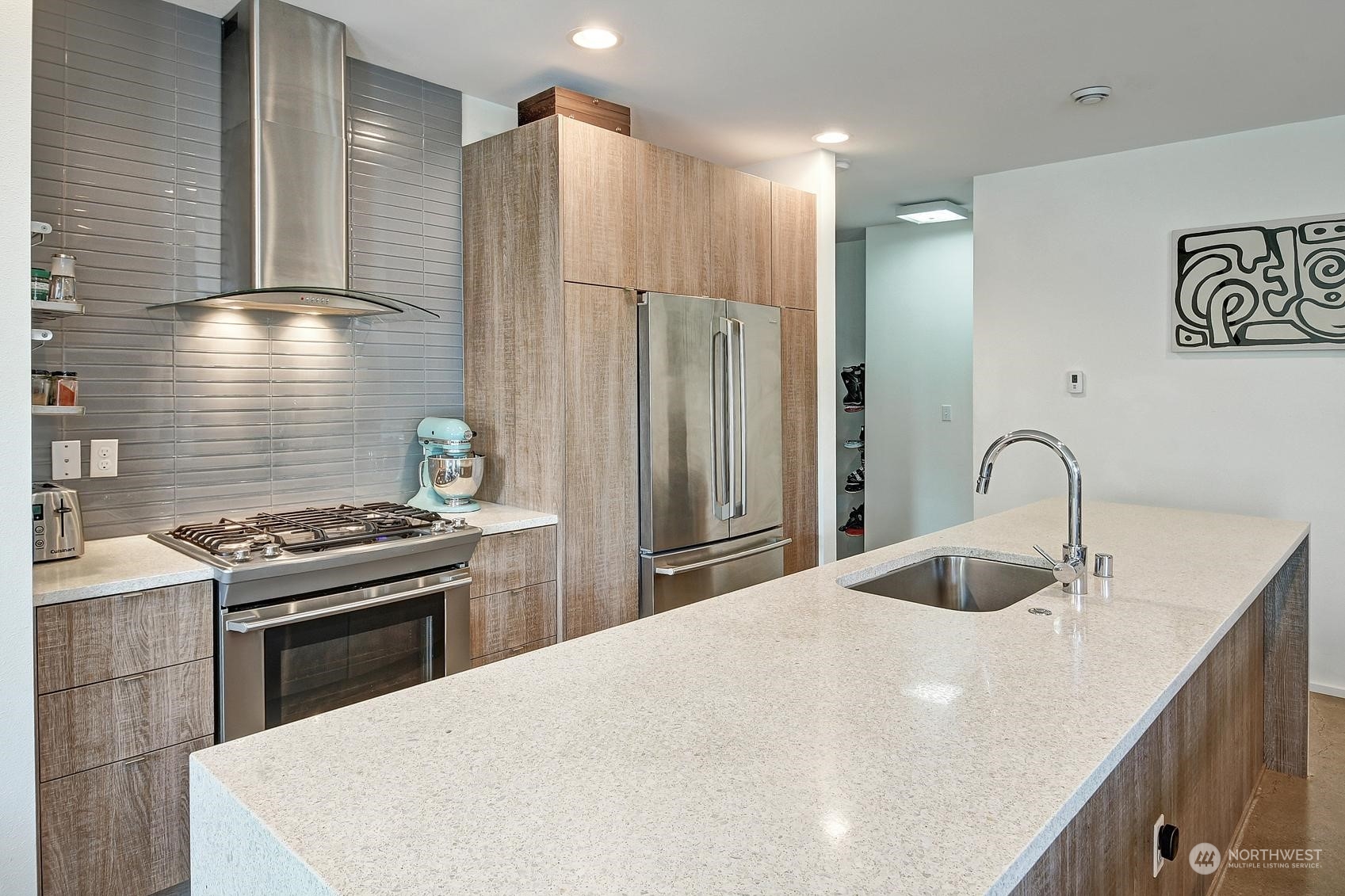 4412 Renton Avenue South Seattle, WA 98108 - Photo 8 of 23 a kitchen with stainless steel appliances granite countertop a sink a stove and refrigerator