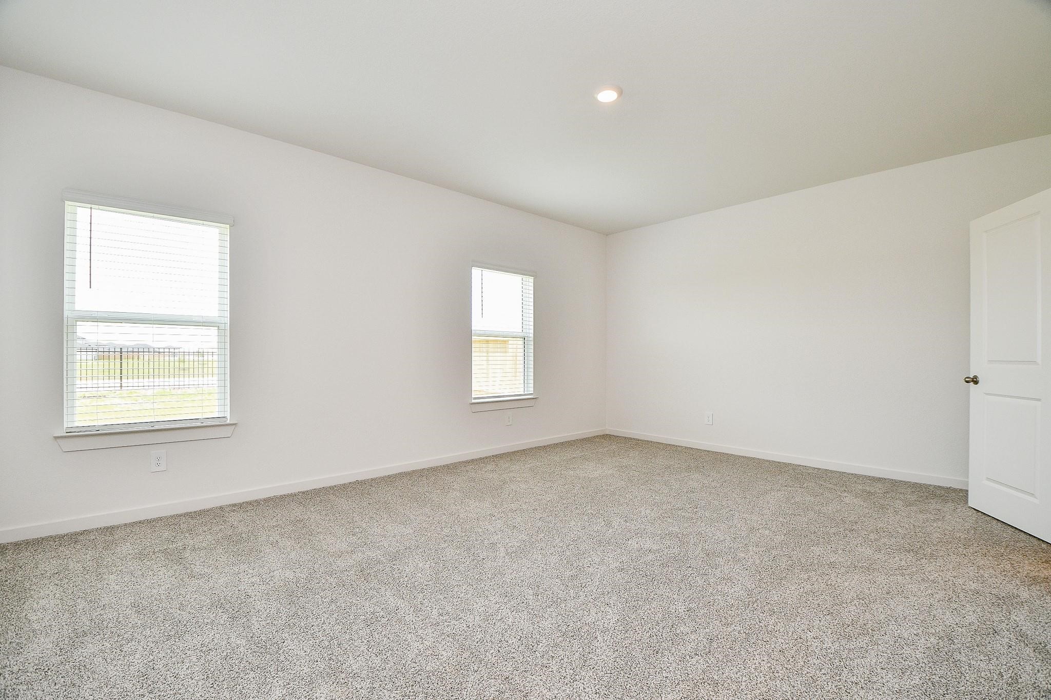3930 Winterbourne Way Fulshear, TX 77441 - Photo 11 of 28 an empty room with a window
