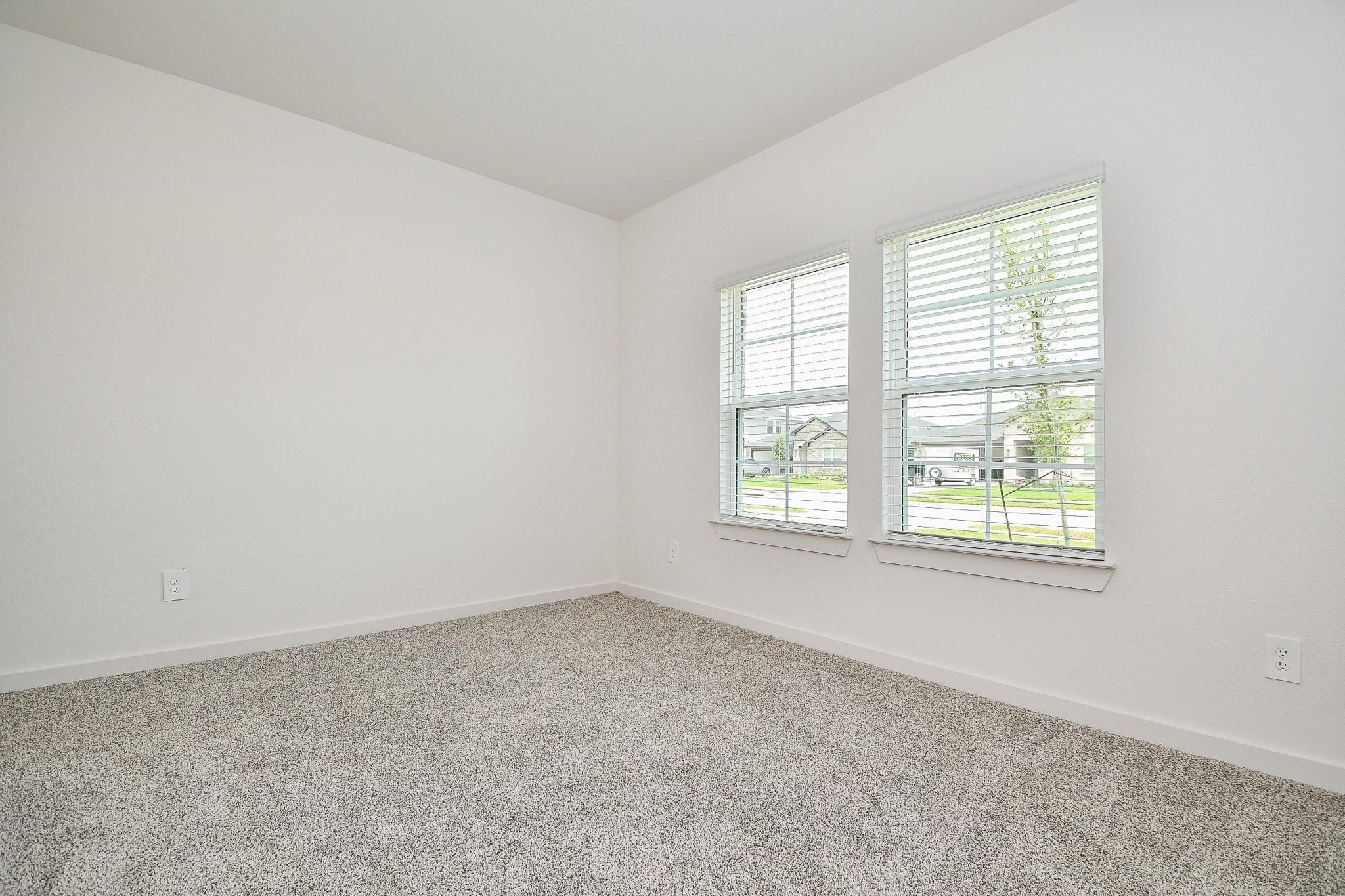 3930 Winterbourne Way Fulshear, TX 77441 - Photo 16 of 28 an empty room with a window