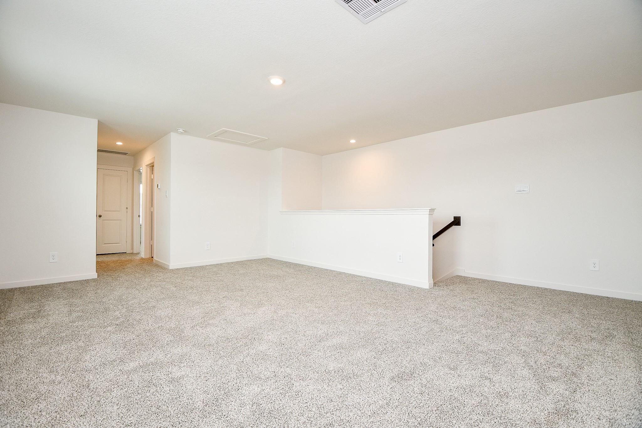 3930 Winterbourne Way Fulshear, TX 77441 - Photo 18 of 28 a view of an empty room