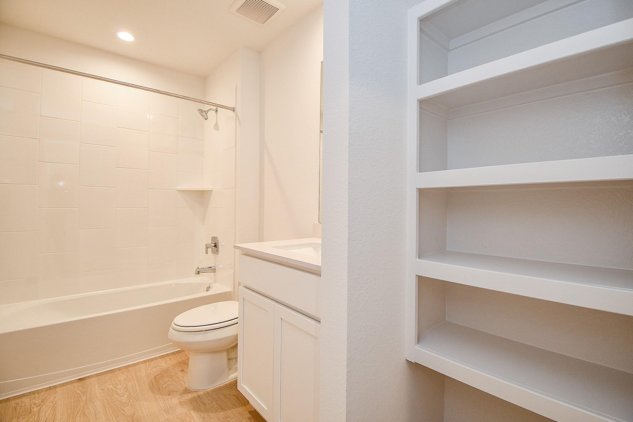 3930 Winterbourne Way Fulshear, TX 77441 - Photo 24 of 28 a bathroom with a toilet and a shower