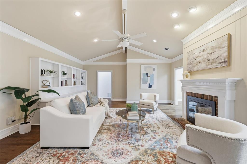 6955 Hawk Road Flower Mound, TX 75022 - Photo 6 of 40 Vaulted living area featuring wood-finish flooring, recessed lighting, and a ceiling fan