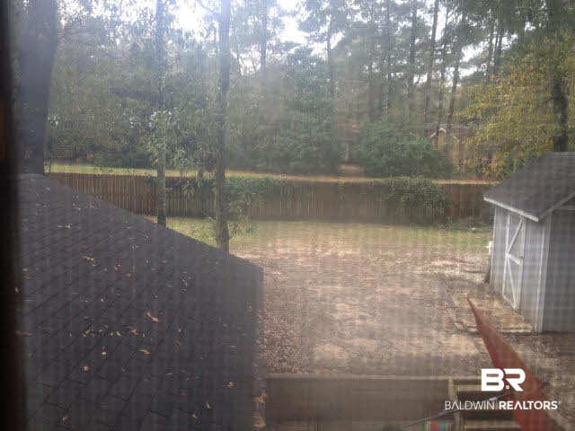 111 Woodside Drive Daphne, AL 36526 - Photo 28 of 31 View from the upstairs window show how much privacy is enjoyed