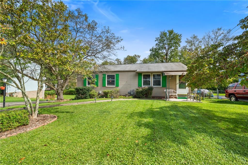 1528 O'Block Road Pittsburgh, PA 15239 - Photo 2 of 19 a front view of a house with a yard