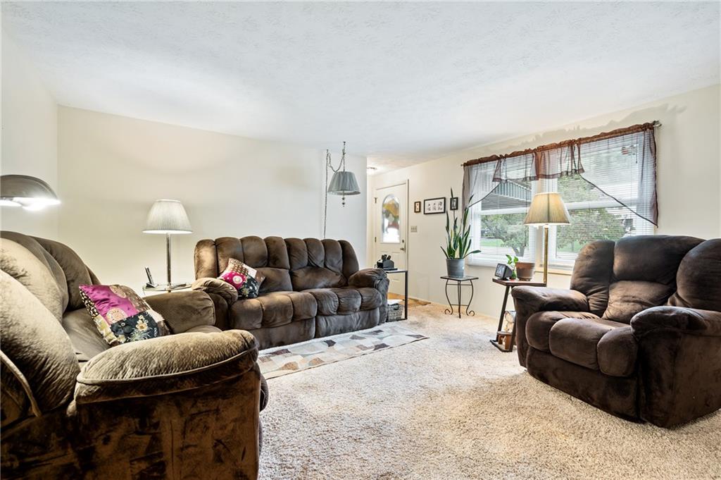 1528 O'Block Road Pittsburgh, PA 15239 - Photo 5 of 19 a living room with furniture and a large window