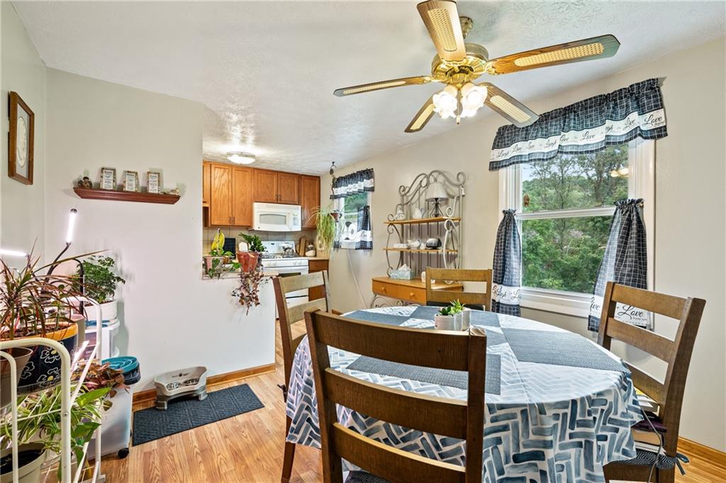 1528 O'Block Road Pittsburgh, PA 15239 - Photo 8 of 19 a view of a dining room with furniture window and outside view