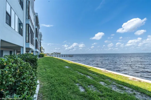 a view of a lake from a yard