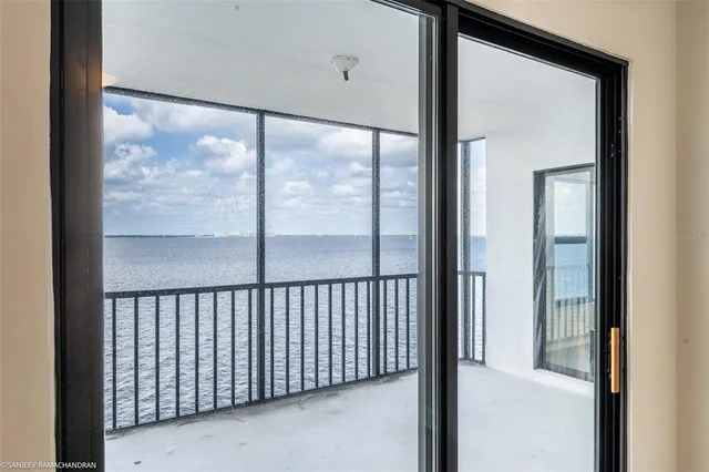 a view of swimming pool with outdoor seating