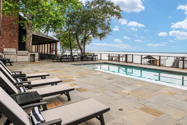 a view of a patio with wooden floor