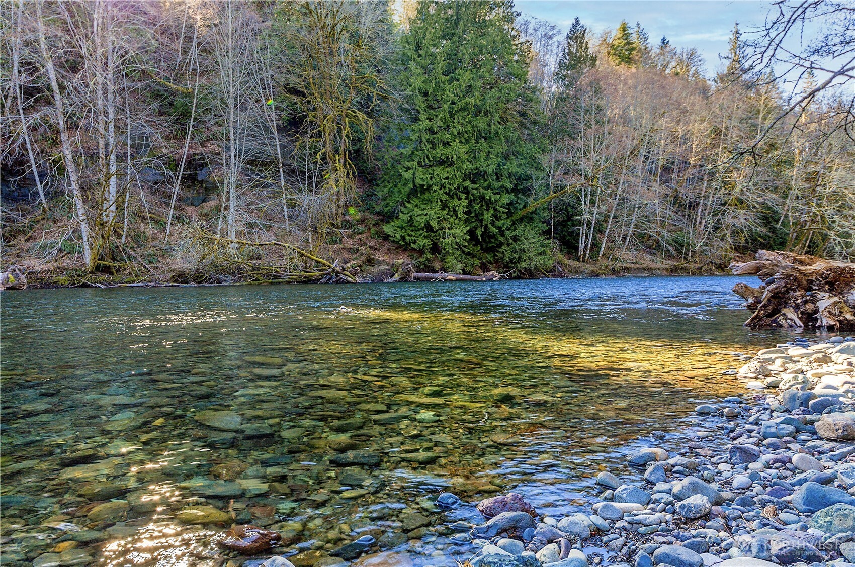 60 Pinto Lane Brinnon, WA 98320 - Photo 15 of 16 a view of a pool with an outdoor space and seating area