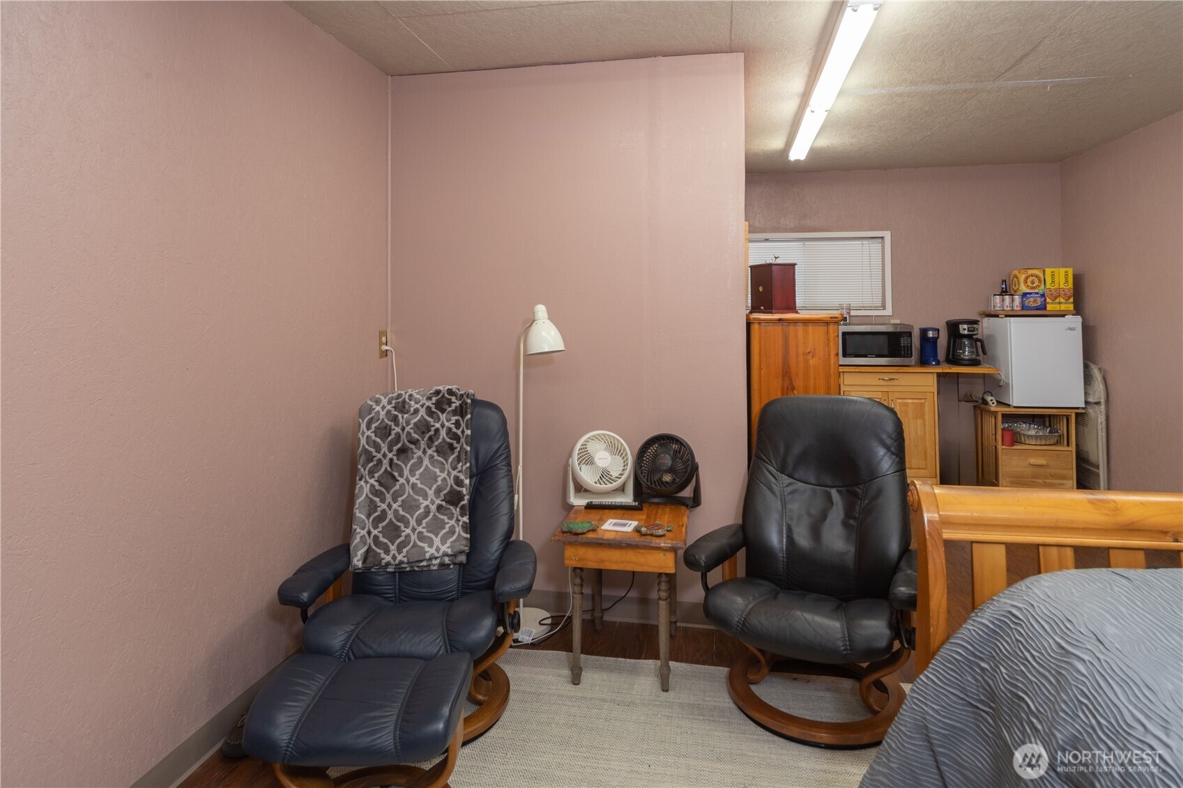 60 Pinto Lane Brinnon, WA 98320 - Photo 6 of 16 a living room with furniture and a chair