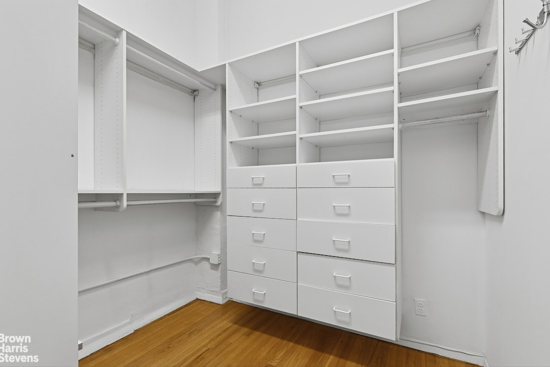 161 West 15th Street, Unit 6B Manhattan, NY 10011 - Photo 11 of 14 a view of walk in closet with empty racks
