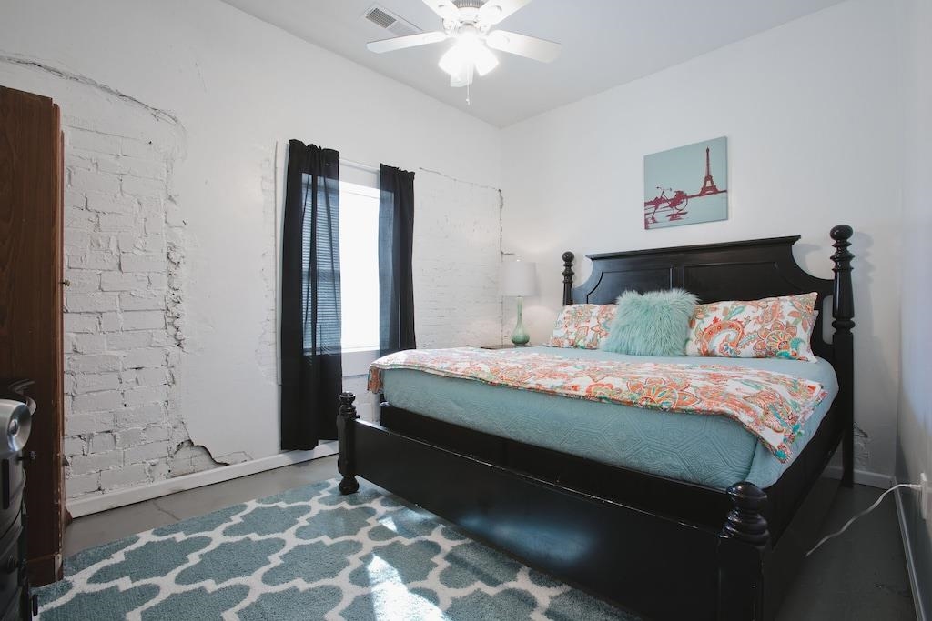 179 Vance Avenue Memphis, TN 38103 - Photo 14 of 25 a bedroom with a bed and a window