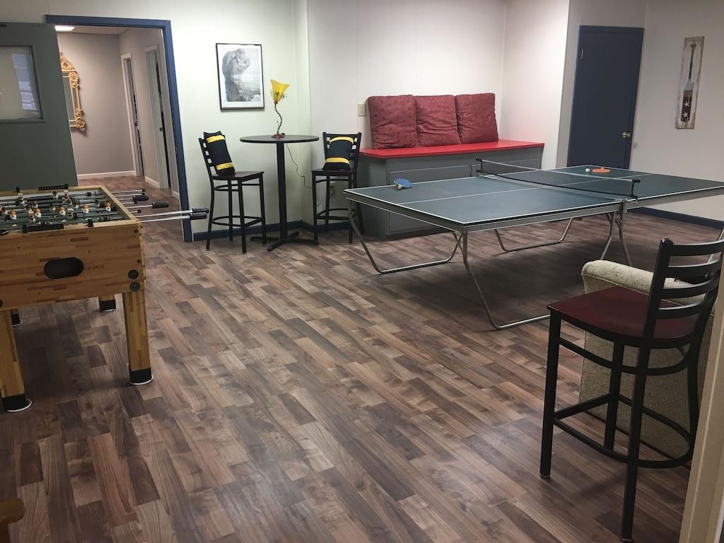 179 Vance Avenue Memphis, TN 38103 - Photo 20 of 25 a living room with furniture a piano and wooden floor