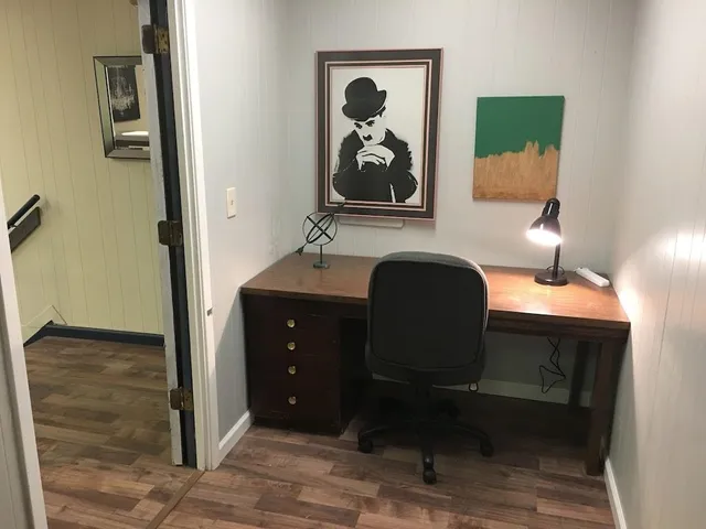 a view of a dining room with furniture