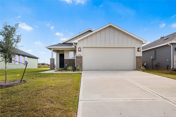 a front view of house with an outdoor space